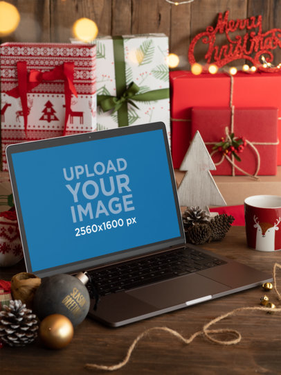 Mockup of a MacBook Pro Placed on a Christmas-Decorated Setting 30651
