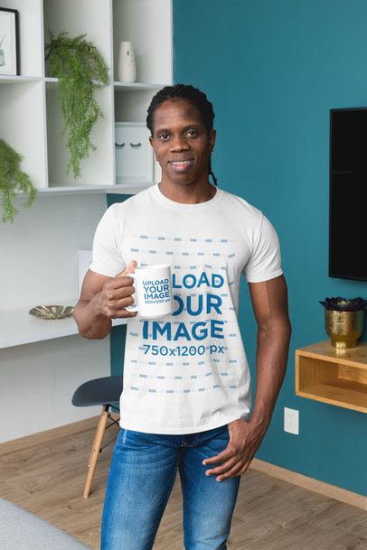 T-Shirt Mockup of a Man in the Living Room Holding a 15 oz Mug 30311
