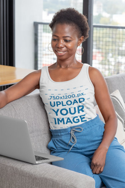 Tank Top Mockup of a Woman Sitting in the Living Room 