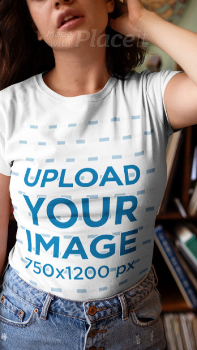 T-Shirt Video of a Young Woman Wearing Denim Shorts at Home 