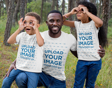 T-Shirt Mockup of a Father and His Two Sons Making Funny Faces