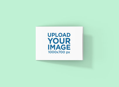 Mockup of a Landscape Brochure Placed Against a Flat Surface