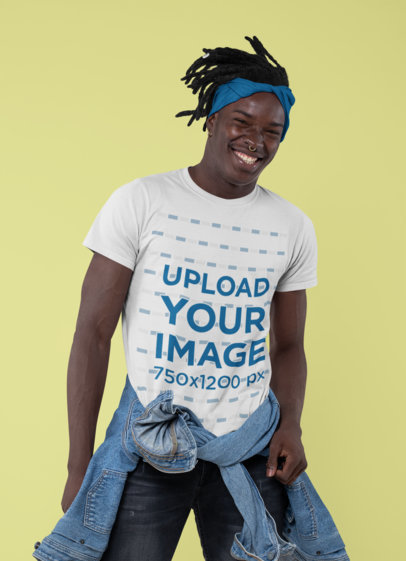 Crew Neck T-Shirt Mockup of a Joyful Man Posing at a Studio