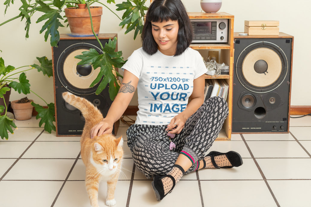 T-Shirt Mockup Featuring a Woman and Her Cat at Home 
