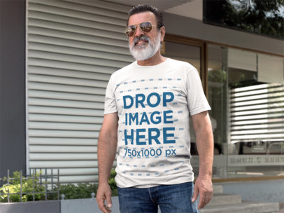 Outdoor T-Shirt Mockup of a Smiling Hispanic Senior