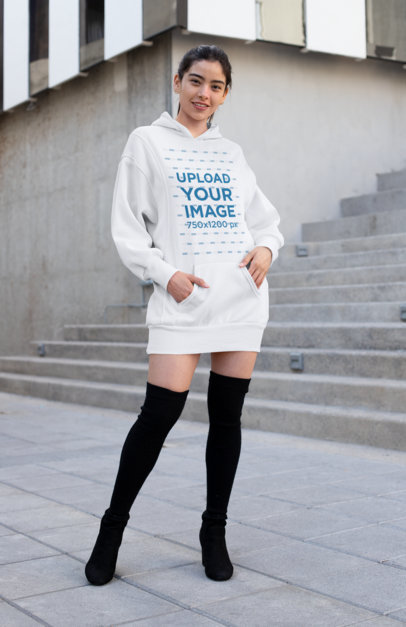 Mockup of a Smiling Woman Wearing a Hoodie Dress