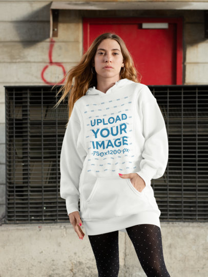 Mockup of a Serious Woman Wearing a Hoodie Dress