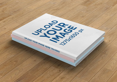 Mockup of Three Magazines Placed on a Wooden Surface