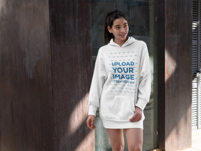 Mockup of a Smiling Woman Wearing a Hoodie Dress 