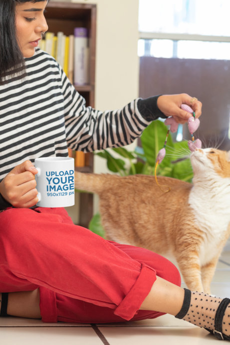 11 oz Mug Mockup of a Woman Playing with Her Cat  at Home