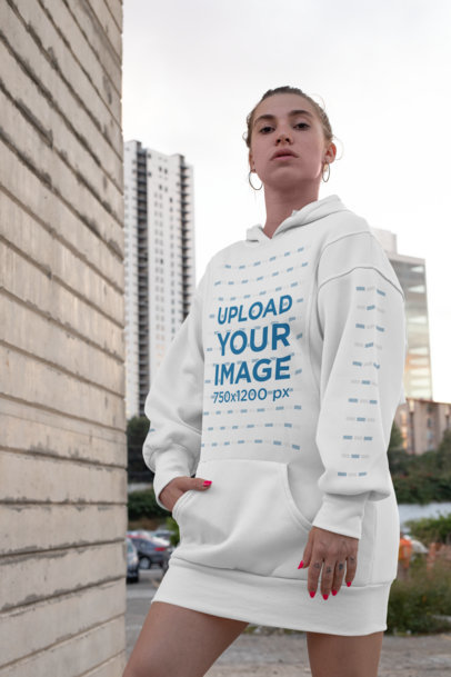 Mockup of an Edgy Woman Wearing a Hoodie Dress with Customizable Sleeves 30578