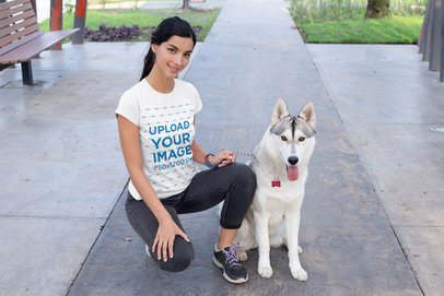 T-Shirt Mockup of a Woman Posing Next to Her Dog 