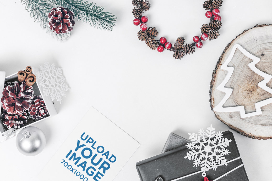Mockup of a Christmas Postcard Among Seasonal Ornaments