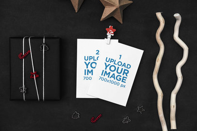 Mockup of Two Postcards Surrounded by Christmas-Themed Supplies