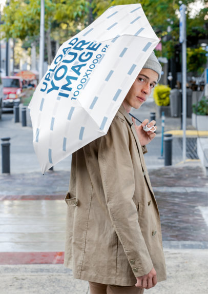 Mockup of a Man Holding an Umbrella on the Street