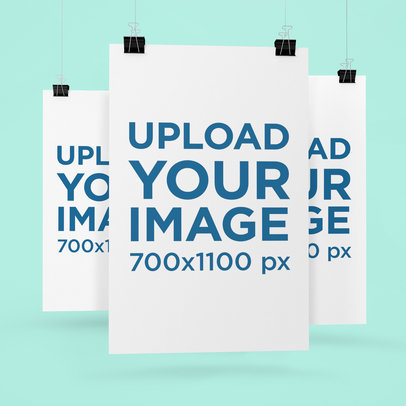 Mockup of Three Posters Hanging Against a Flat Surface