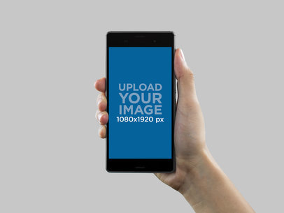 Mockup of a Sony Xperia Z5 Held Over a Transparent Background 