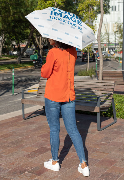 Umbrella Mockup of a Woman Walking in the City