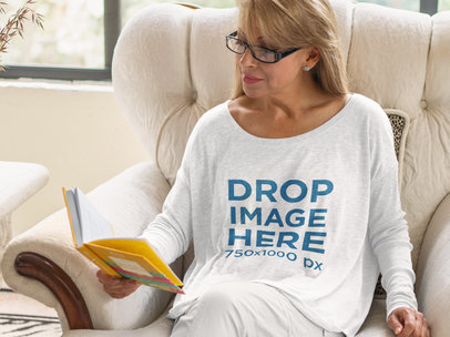 Long Sleeve T-Shirt Mockup of a Woman Reading at Home