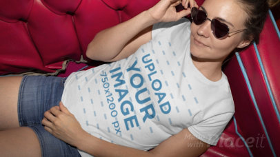 T-Shirt Video of a Woman with Heart-Shaped Sunglasses Sitting on a Couch 22440