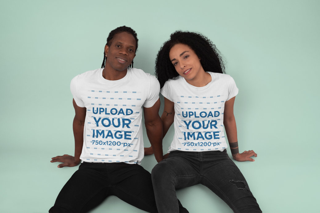 Crew Neck T-Shirt Mockup of a Couple Sitting at a Studio