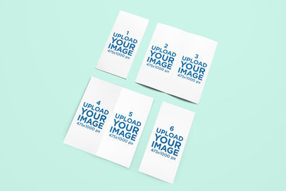 Mockup of a Set of Bifold Brochures on a Plain Background