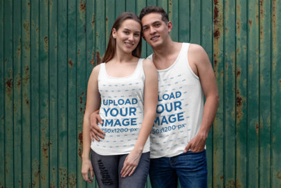 Mockup of a Couple Wearing Tank Tops While Hugging 
