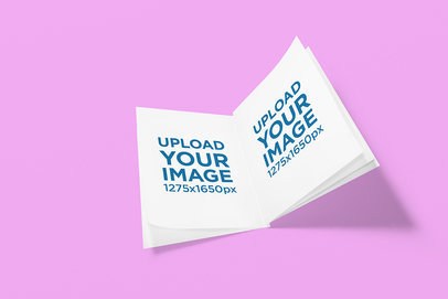 Mockup of an Open Booklet Placed on a Customizable Background 