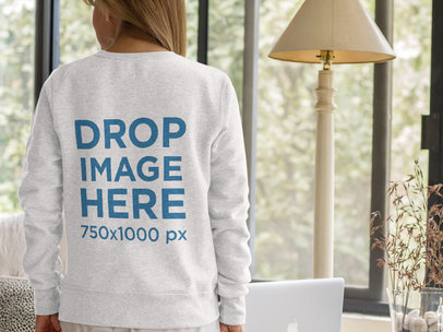 Lady Wearing a Crewneck Sweater Mockup from the Back