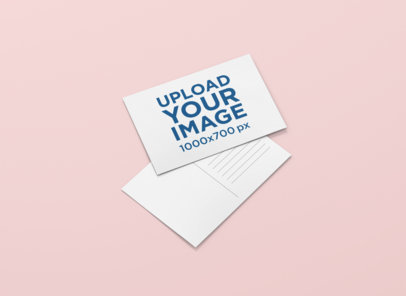 Mockup of One Postcard Facing up and One Facing Down 1227-el