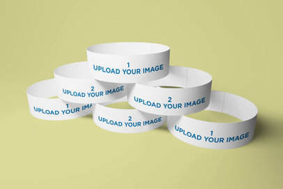 Mockup of a Pile of Paper Wristbands in a Simple Setting