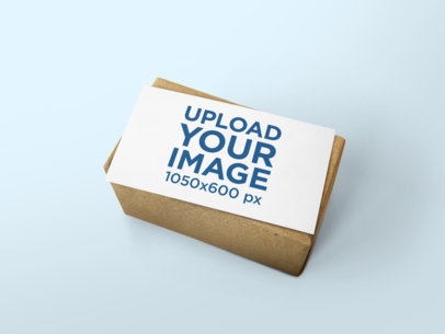 Mockup of a Business Card over a Brown Paper Package 1559-el