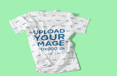 Mockup of a Sublimated T-Shirt Thrown on a Solid Color Surface 1386-el