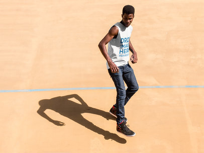 Sleeveless Shirt Mockup of a Young Man Jumping Outside
