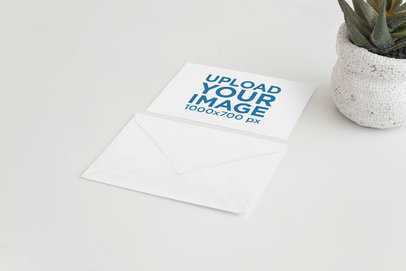 Mockup of a Postcard and an Envelope Featuring a Desert Plant Pot