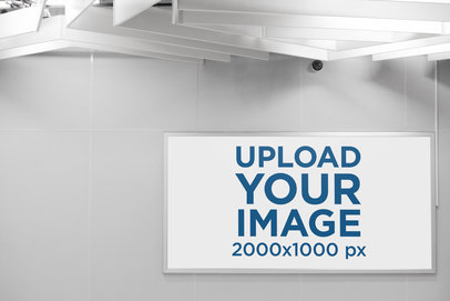 Mockup of a Horizontal Banner Placed on a Wall with a Security Camera