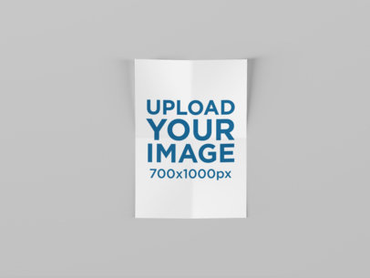 Mockup Featuring a Folded A4 Flyer Against a Solid Color Background  