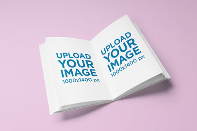 Mockup of an Open Book on a Solid Color Surface 1344-el