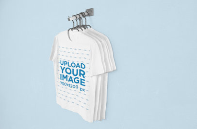 Mockup of a Set of T-Shirts Hanging From a Metal Bar 1383-el