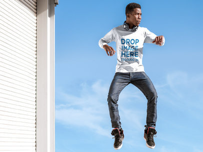 Long Sleeve T-Shirt Mockup of a Young Man Jumping Mid-Air