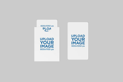 Mockup of Two Gift Cards and a Gift Card Holder Placed Against a Solid Color Background 