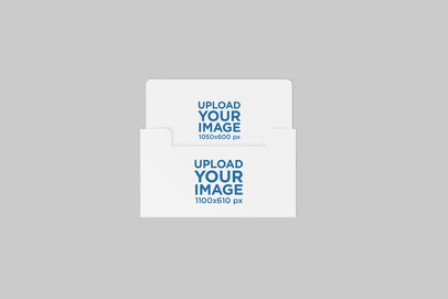 Mockup Featuring a Gift Card with Its Envelope Placed on a Solid Color Surface 