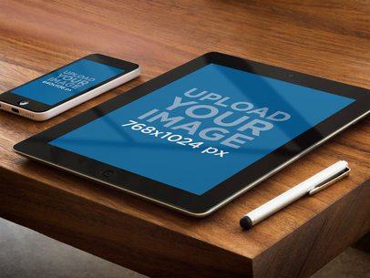Responsive Mockup of an iPad and an iPhone 5c Placed on a Wooden Table 
