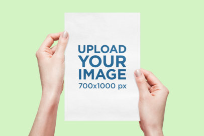 Mockup of a Woman's Hands Holding an A5 Flyer