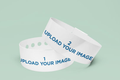 Mockup of Two Vinyl Wristbands Placed in a Minimalist Setting