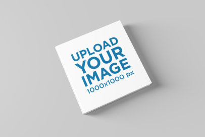 Square Book Mockup with a Customizable Background 