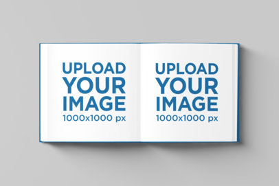 Minimal Mockup of an Open Square Book Placed on a Colored Surface 