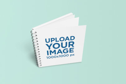 Spiral Notebook Mockup Standing in a Minimalistic Setting