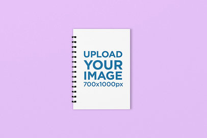 Spiral Notebook Mockup Featuring a Plain Background 