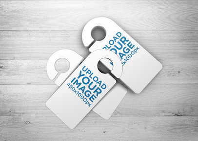 Mockup of a Bunch of Door Hangers Piled over a Wooden Surface 1734-el